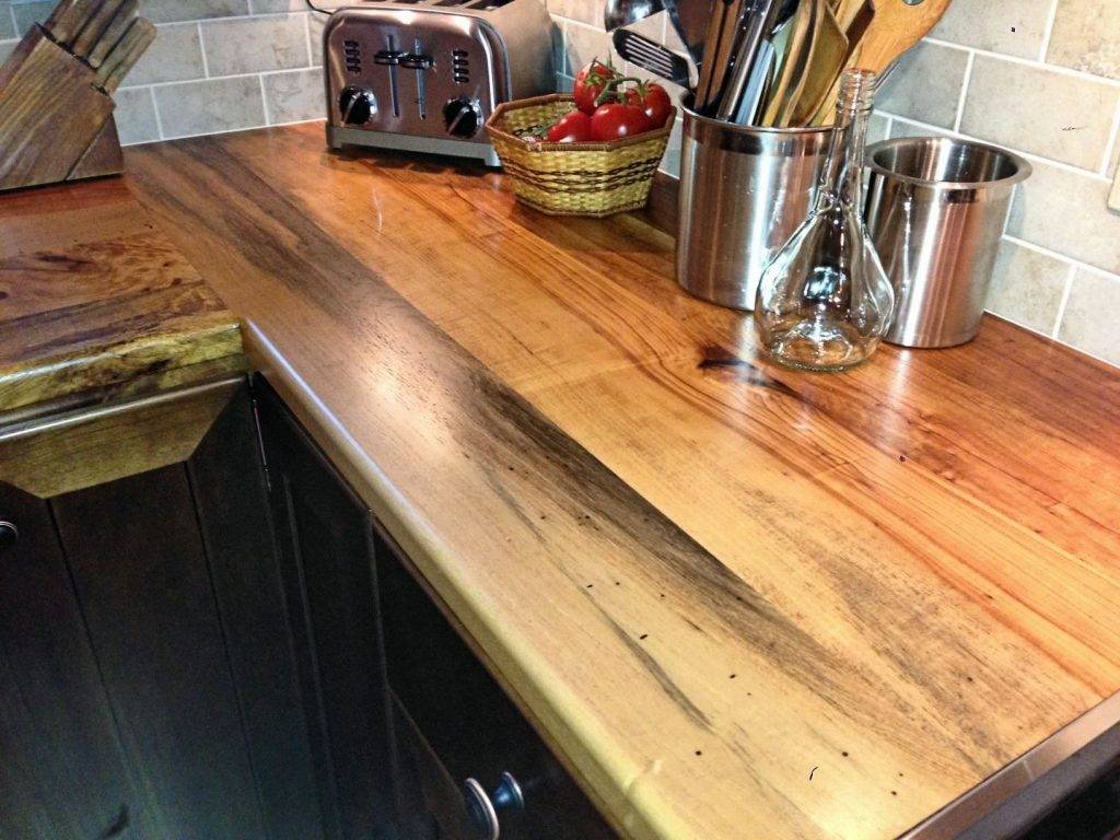 Чем покрыть столешницу из дерева на кухне: лак и масло в качестве защиты